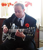 Gabe Stivala with guitar - Small Ensemble Guitarist.